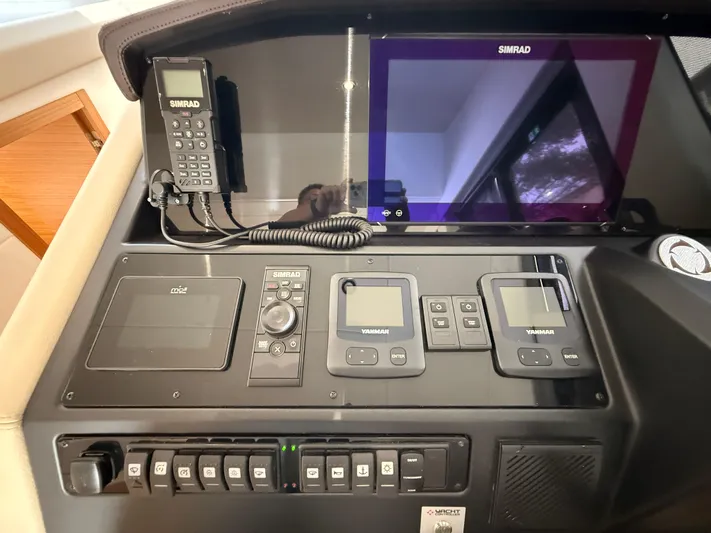  Yacht Photos Pics 2024 Greenline 48 Fly yacht dashboard with Simrad and Yanmar navigation equipment.