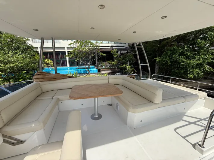  Yacht Photos Pics Luxurious seating area on 2024 Greenline 48 Fly yacht, featuring elegant design and comfort.