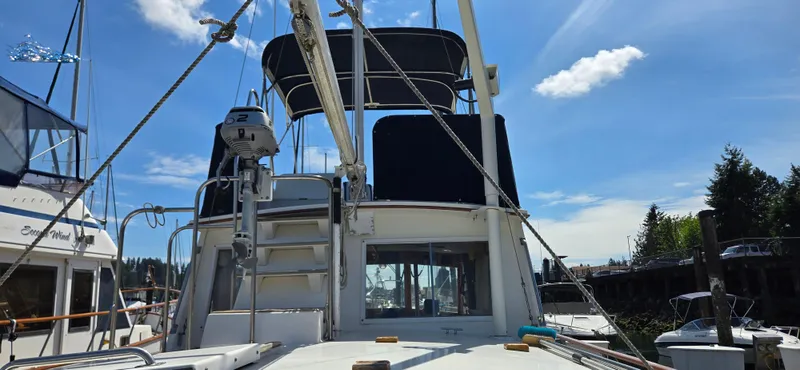 Grand Finale Yacht Photos Pics 1991 Grand Banks 36 Classic yacht docked under a clear blue sky.