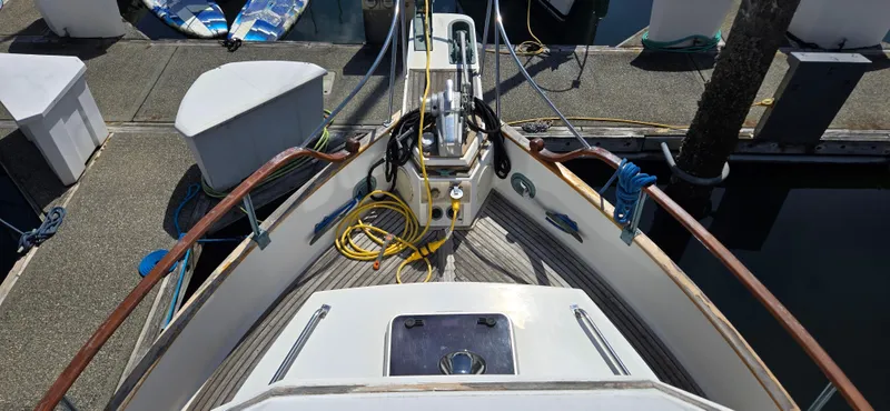 Grand Finale Yacht Photos Pics Bow view of 1991 Grand Banks 36 Classic yacht docked at marina.