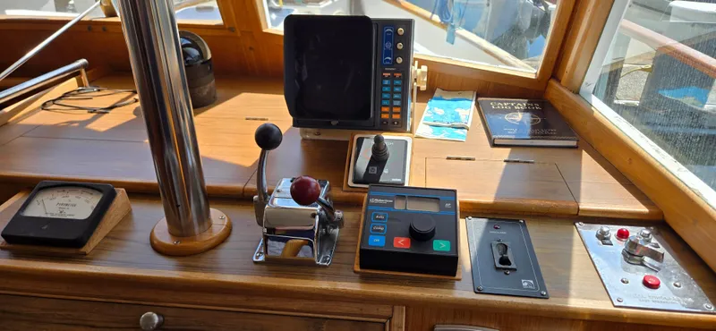 Grand Finale Yacht Photos Pics Helm of 1991 Grand Banks 36 Classic with navigation controls and instruments.