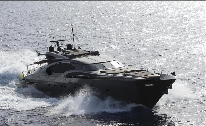  Yacht Photos Pics Luxury Palmer Johnson 120 yacht cruising on open sea, 2003 model.