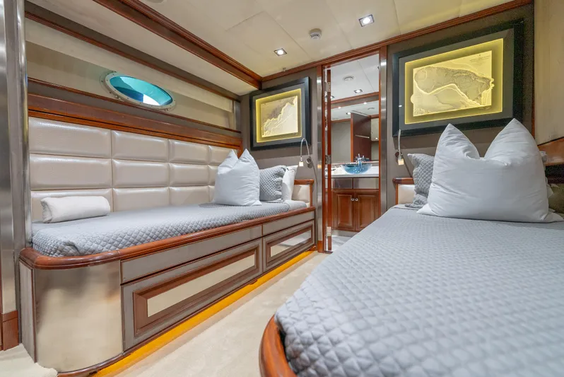 Yacht Photos Pics Luxurious interior of 2003 Palmer Johnson 120 yacht with elegant twin beds and modern decor.