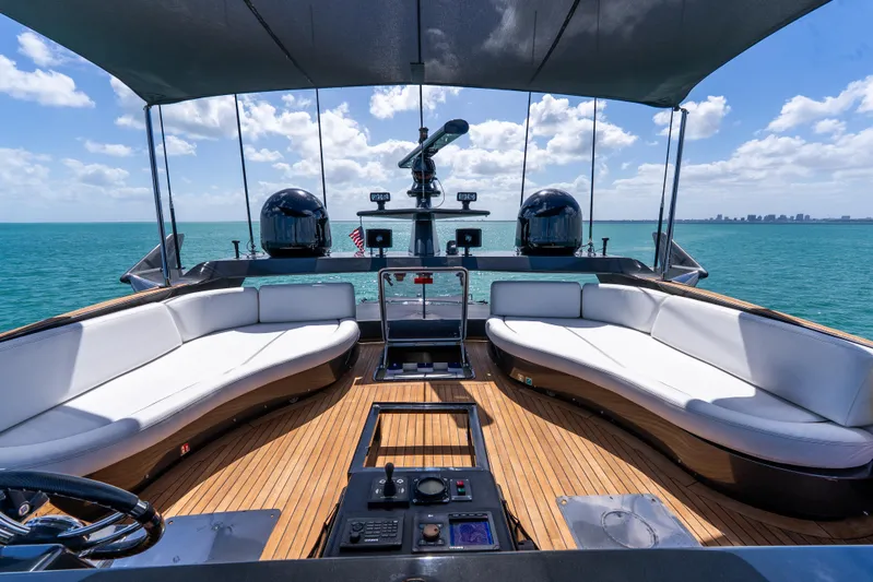  Yacht Photos Pics Luxurious Palmer Johnson 120 yacht deck with elegant seating, ocean view, and modern amenities, 2003 model.