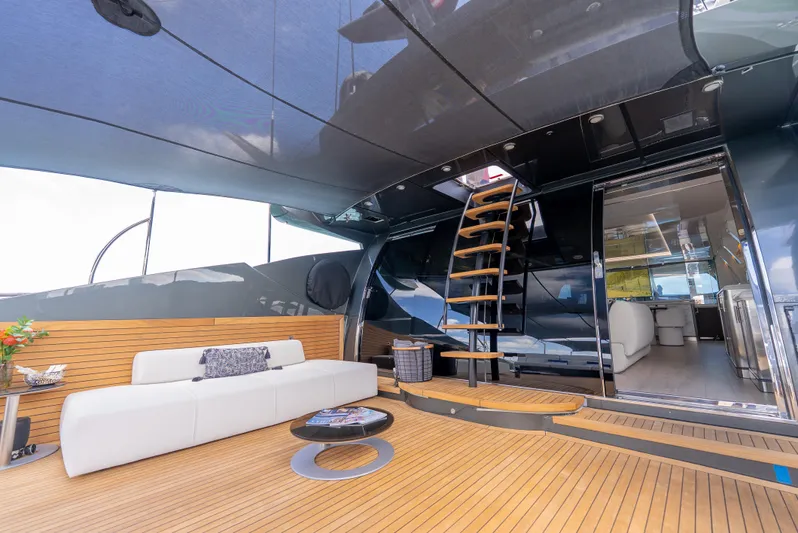  Yacht Photos Pics Luxurious Palmer Johnson 120 yacht interior, featuring elegant seating and modern design, built in 2003.