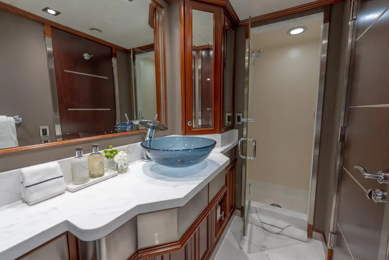  Yacht Photos Pics Luxurious yacht bathroom with glass sink and shower, Palmer Johnson 120, 2003 model.