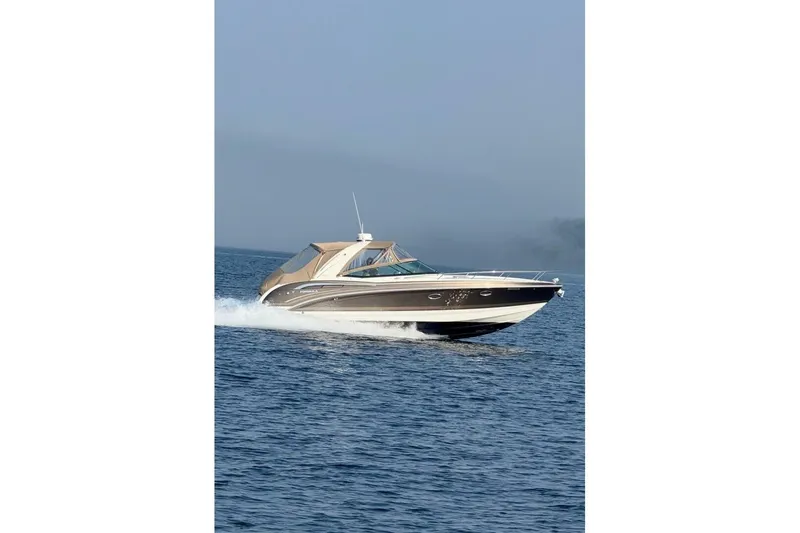  Yacht Photos Pics 2016 Formula 350 Sunsport cruising on open water, showcasing sleek design and performance.