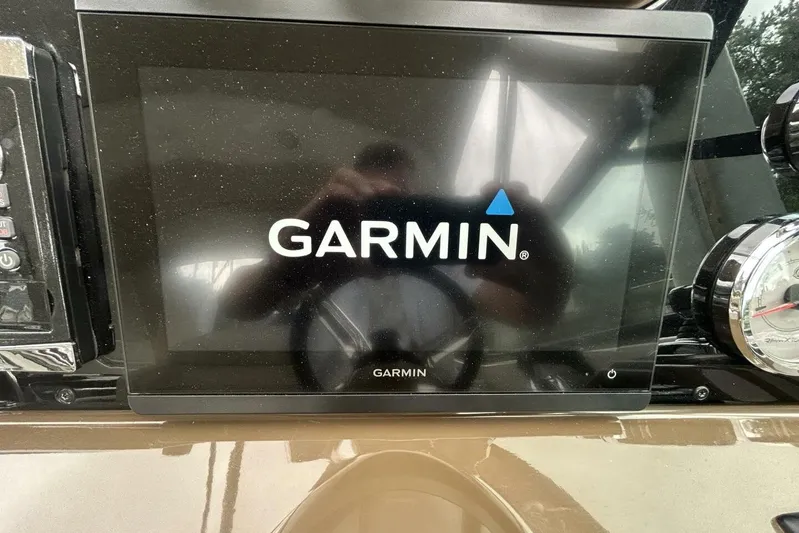  Yacht Photos Pics Garmin display on 2016 Formula 350 Sunsport dashboard, featuring navigation technology.