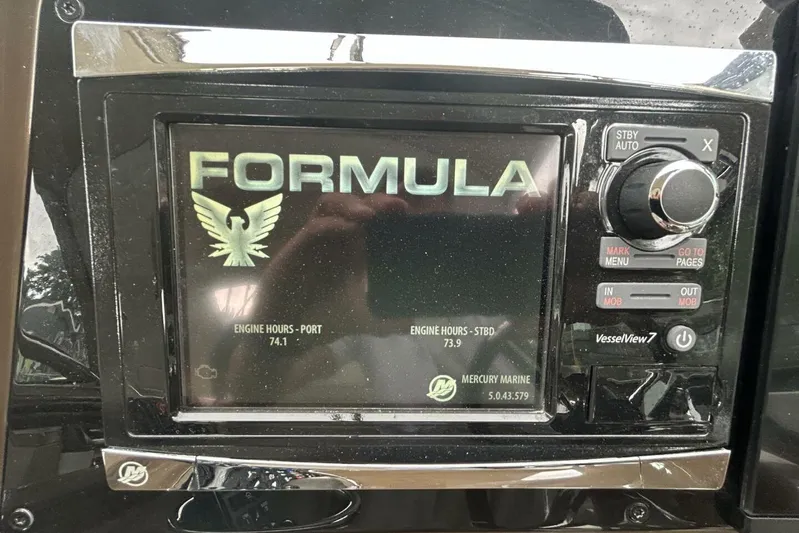  Yacht Photos Pics Dashboard display of 2016 Formula 350 Sunsport showing engine hours and controls.