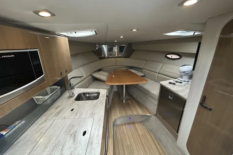  Yacht Photos Pics Luxurious interior of a 2016 Formula 350 Sunsport boat with modern amenities.