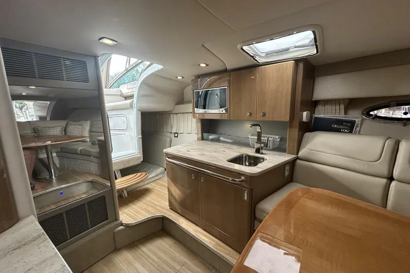  Yacht Photos Pics Interior of 2016 Formula 350 Sunsport yacht with modern kitchen and seating area.