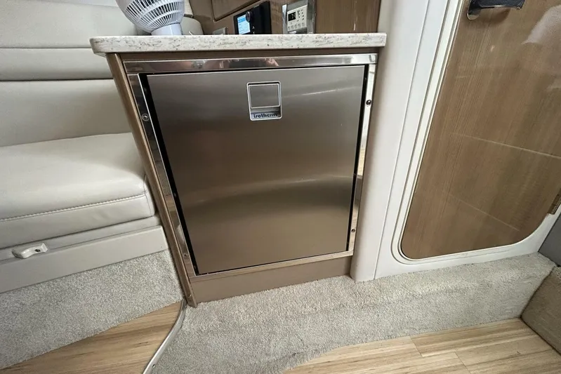  Yacht Photos Pics Stainless steel mini fridge in 2016 Formula 350 Sunsport boat interior.