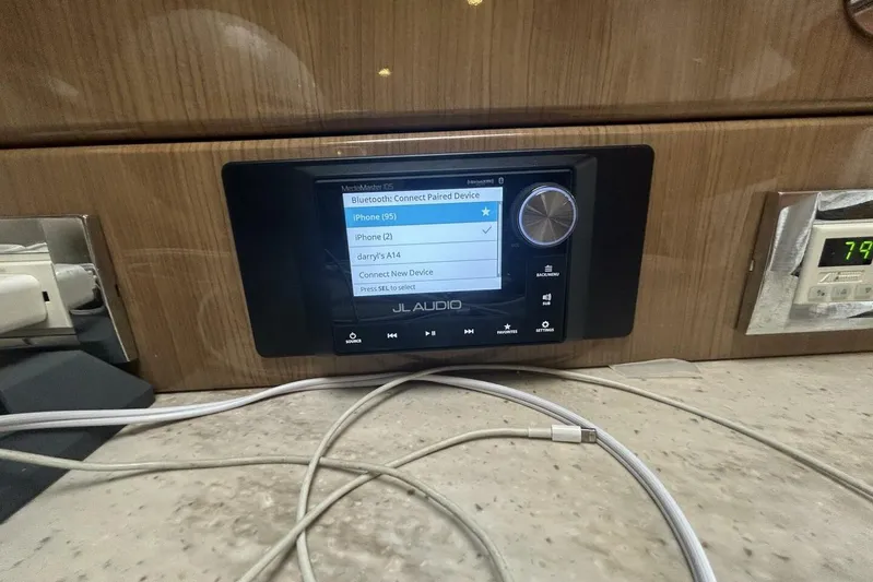  Yacht Photos Pics JL Audio Bluetooth device interface on 2016 Formula 350 Sunsport boat dashboard.