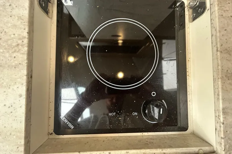  Yacht Photos Pics Electric stove on 2016 Formula 350 Sunsport boat, featuring a Kenyon cooktop.