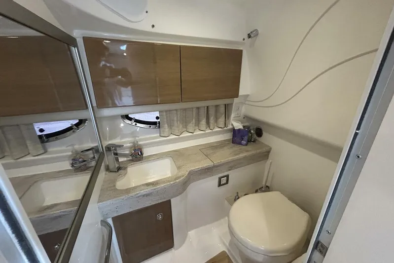  Yacht Photos Pics 2016 Formula 350 Sunsport bathroom with modern fixtures and compact design.
