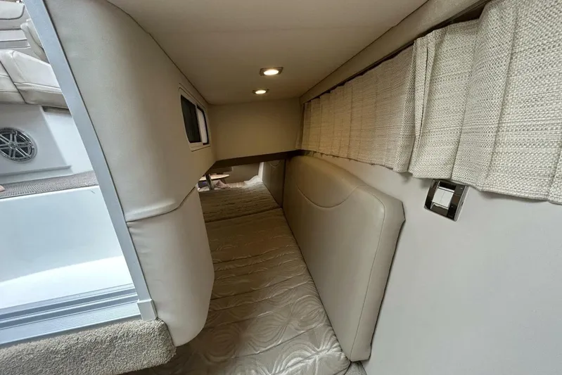  Yacht Photos Pics Interior cabin of 2016 Formula 350 Sunsport boat, featuring cozy sleeping area.