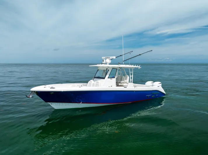  Yacht Photos Pics 2019 Everglades 335 Center Console boat on calm ocean waters.