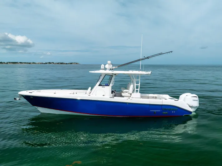  Yacht Photos Pics 2019 Everglades 335 Center Console boat on calm ocean waters.