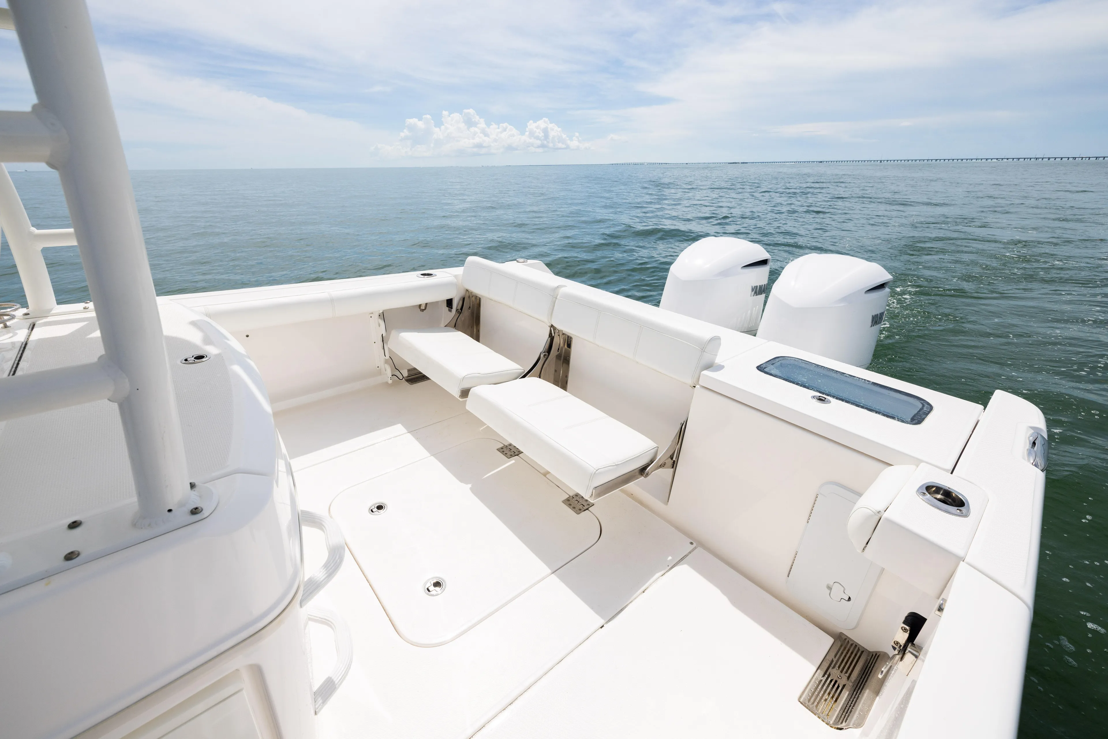  Yacht Photos Pics 2019 Everglades 335 Center Console boat with dual engines on open water.