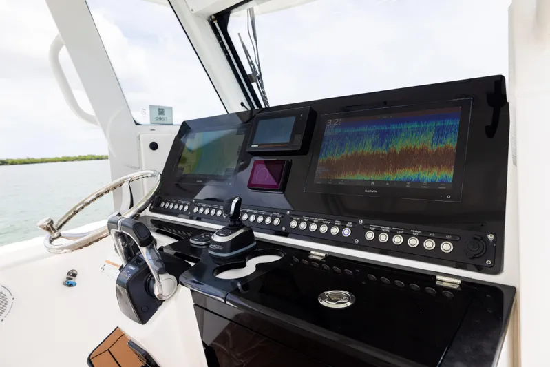  Yacht Photos Pics Control panel of 2019 Everglades 335 Center Console boat with advanced navigation displays.