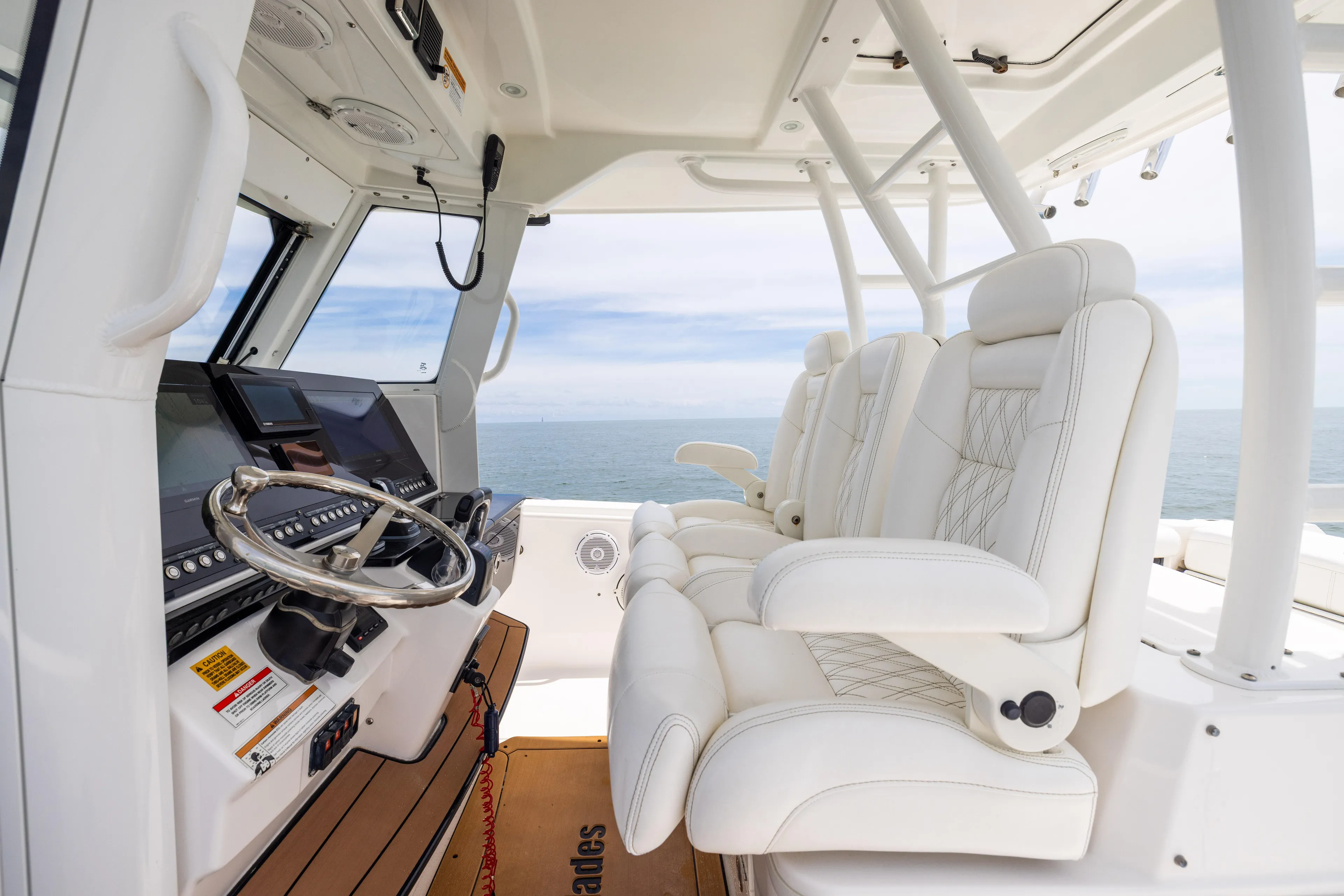  Yacht Photos Pics 2019 Everglades 335 Center Console interior with luxurious seating and advanced helm controls.