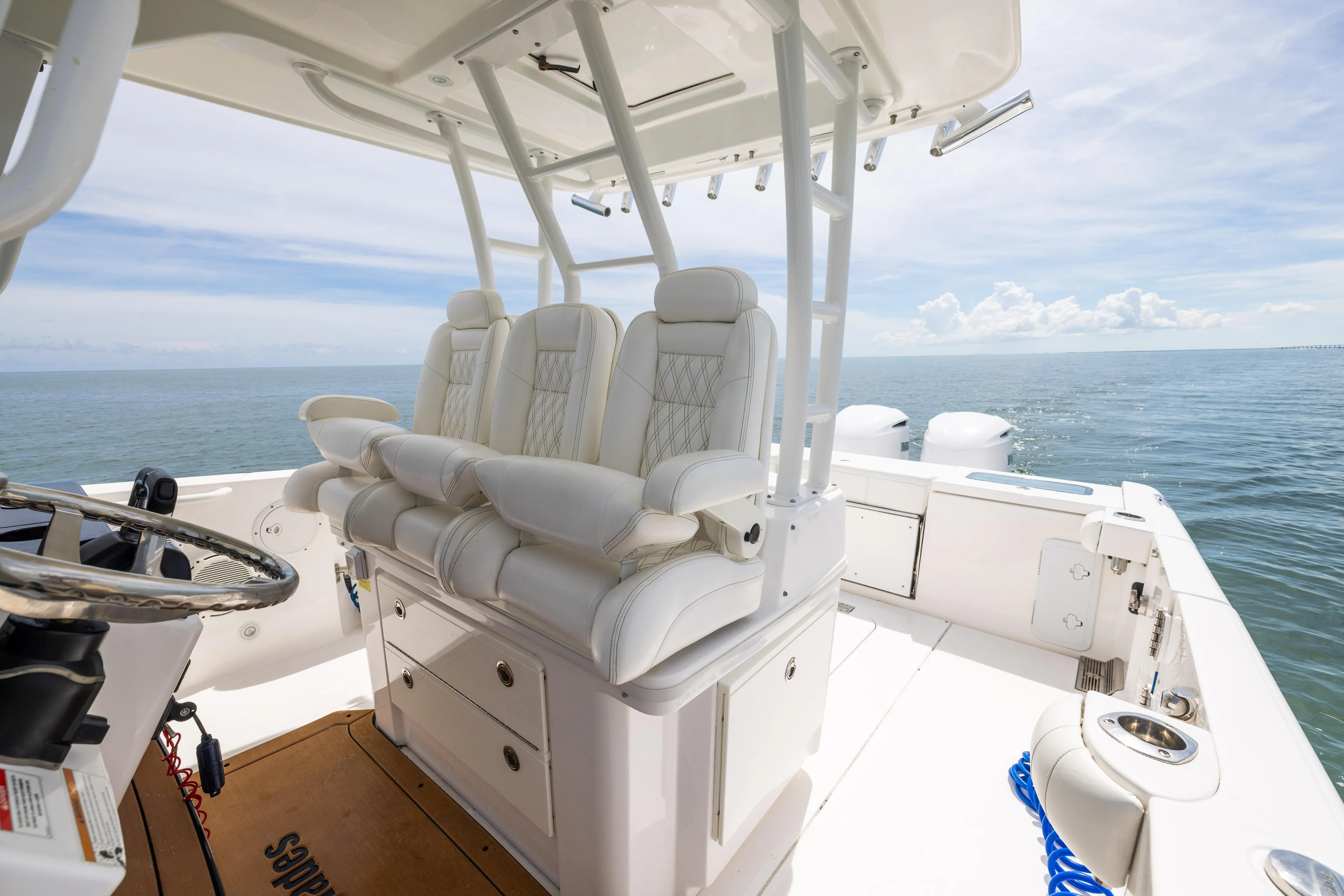  Yacht Photos Pics 2019 Everglades 335 Center Console boat interior with luxurious seating and ocean view.