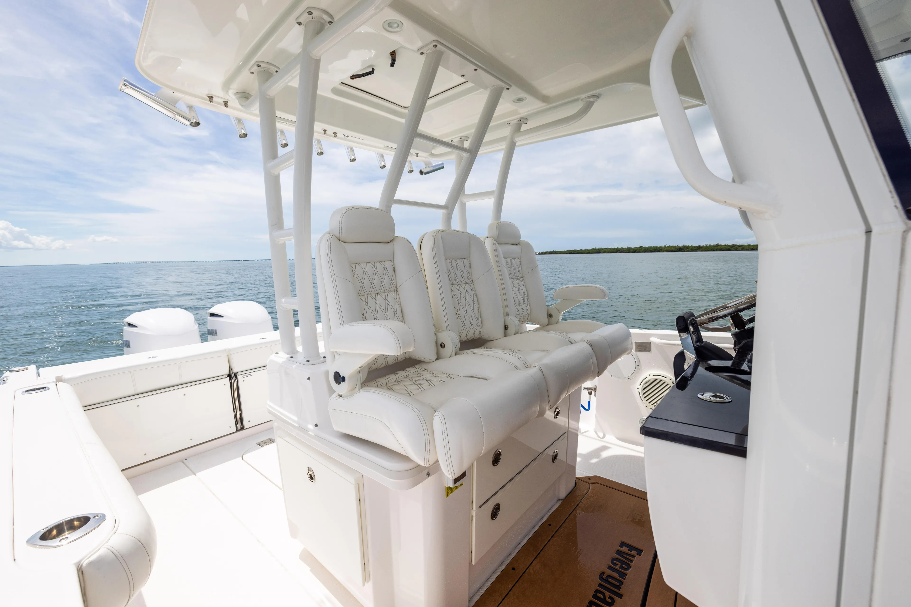  Yacht Photos Pics 2019 Everglades 335 Center Console boat interior with luxurious seating and ocean view.