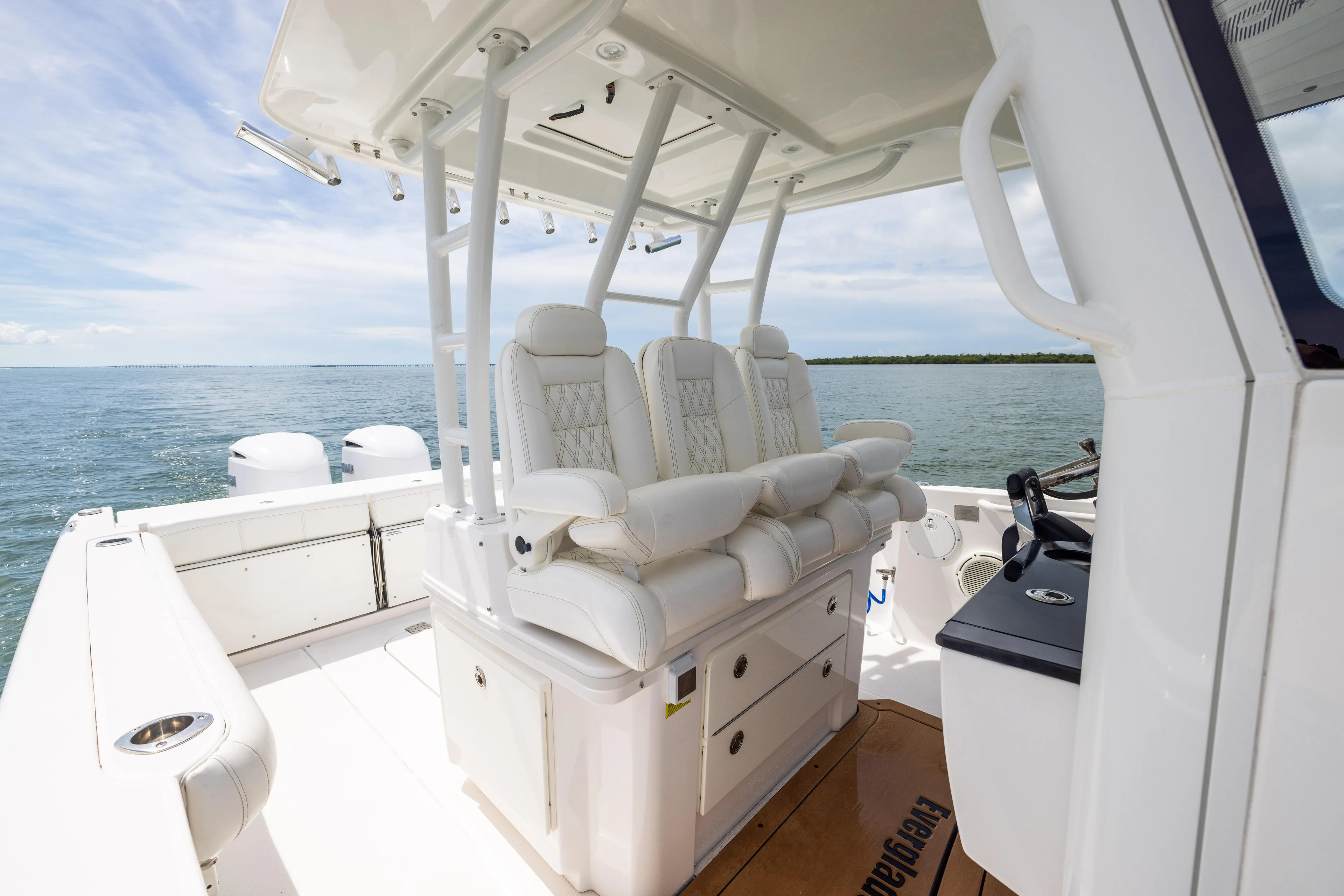  Yacht Photos Pics 2019 Everglades 335 Center Console boat interior with luxurious seating and ocean view.
