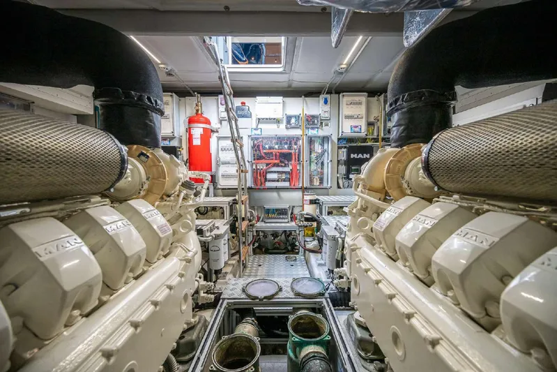  Yacht Photos Pics Engine room of 2019 Riva 66 RIBELLE yacht, featuring dual MAN engines.