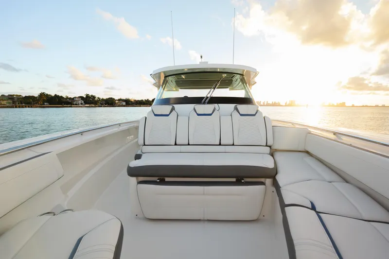  Yacht Photos Pics 2020 Tiara Yachts 43 LS boat interior with luxurious seating at sunset.