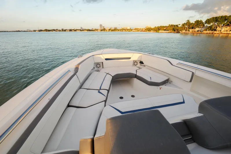  Yacht Photos Pics 2020 Tiara Yachts 43 LS boat interior with spacious seating, overlooking calm waters.