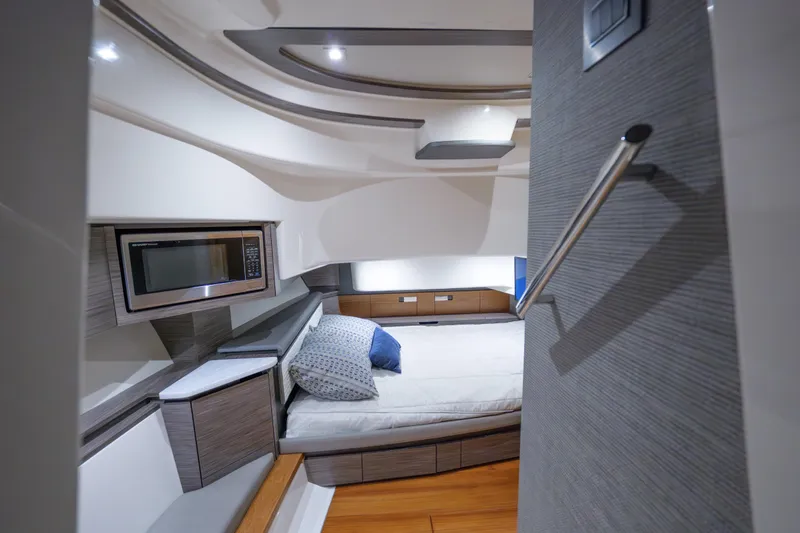  Yacht Photos Pics Luxurious interior cabin of 2020 Tiara Yachts 43 LS with modern amenities.