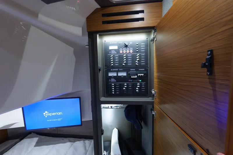  Yacht Photos Pics 2020 Tiara Yachts 43 LS interior with control panel and screen.