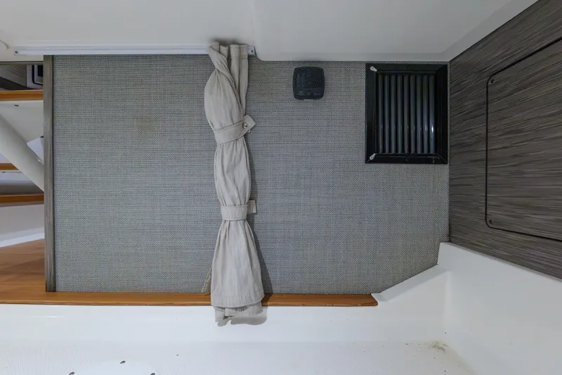  Yacht Photos Pics Interior view of 2020 Tiara Yachts 43 LS, featuring carpet and vent details.