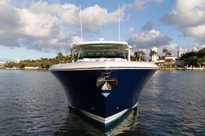  Yacht Photos Pics 2020 Tiara Yachts 43 LS on water, front view, under blue sky.
