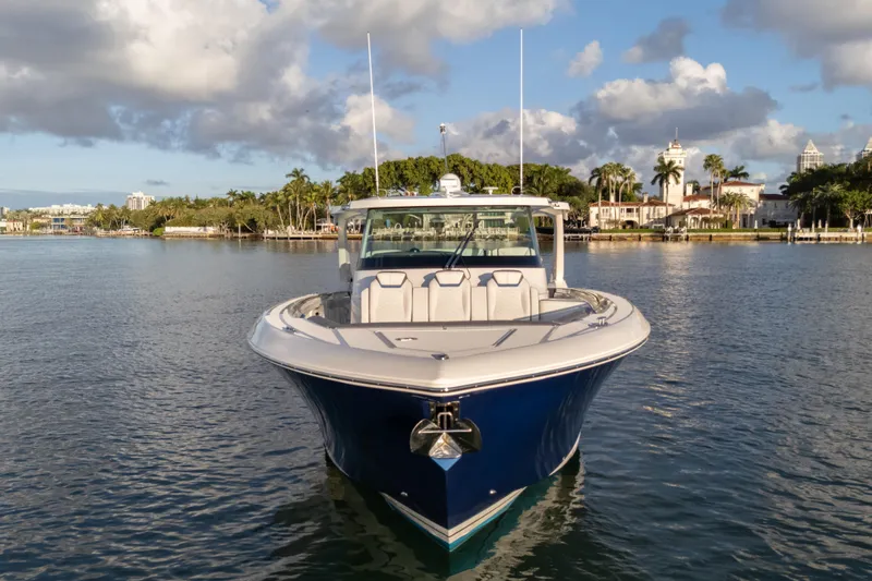  Yacht Photos Pics 2020 Tiara Yachts 43 LS on calm water, showcasing sleek design and luxury features.