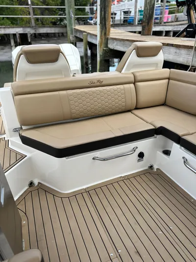  Yacht Photos Pics 2021 Sea Ray SDX 290 Outboard boat with tan leather seating and teak flooring.