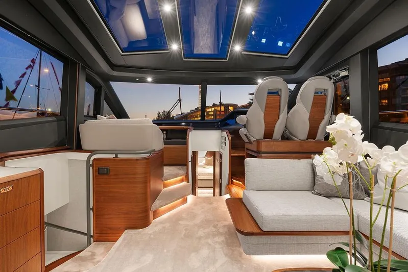 S72531 Yacht Photos Pics Luxurious interior of 2025 Princess S72 yacht with modern design and elegant furnishings.