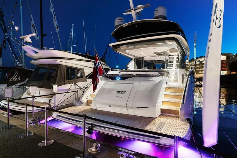 S72531 Yacht Photos Pics Luxury 2025 Princess S72 yacht docked at night with illuminated deck.