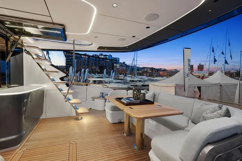 S72531 Yacht Photos Pics Luxurious 2025 Princess S72 yacht interior with elegant seating and modern design at sunset.