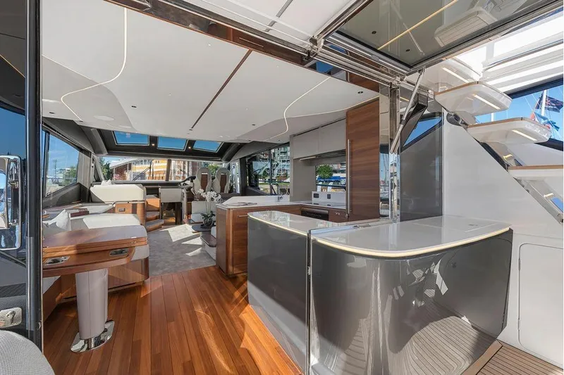S72531 Yacht Photos Pics Luxurious interior of 2025 Princess S72 yacht with modern design and wooden flooring.