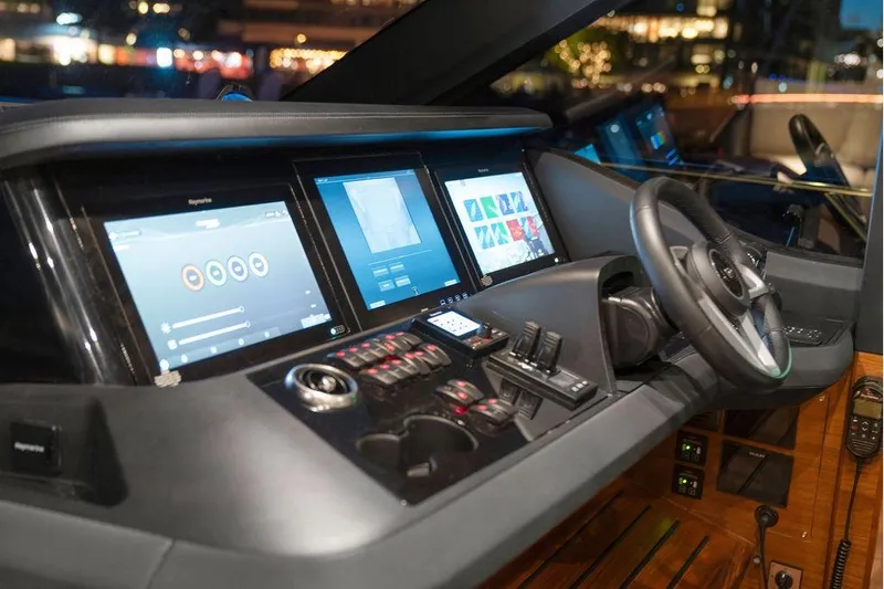 S72531 Yacht Photos Pics 2025 Princess S72 yacht helm with advanced navigation screens and controls.