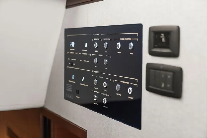 S72531 Yacht Photos Pics Control panel of 2025 Princess S72 yacht, featuring modern interface and switches.