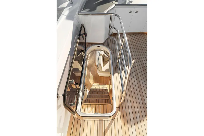 S72531 Yacht Photos Pics Staircase on 2025 Princess S72 yacht with sleek wooden deck and modern design.