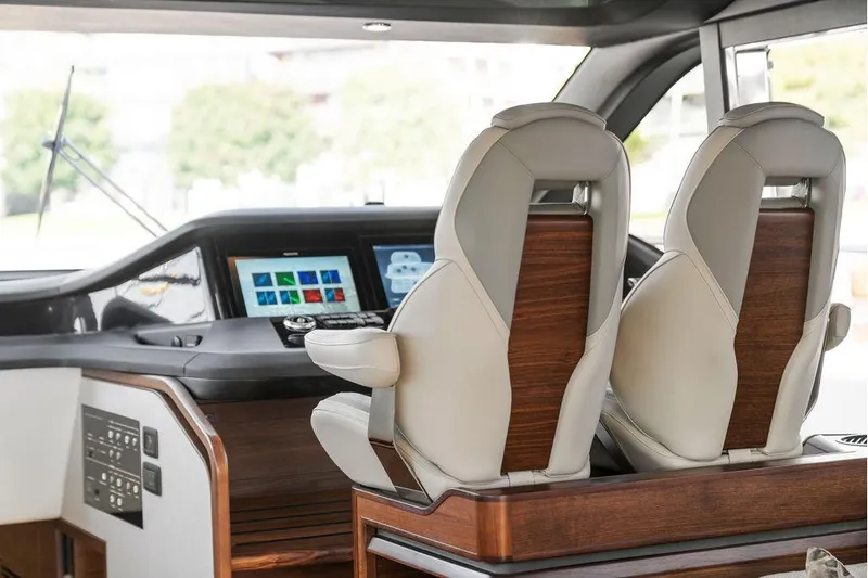 S72531 Yacht Photos Pics Luxury interior of 2025 Princess S72 yacht with modern helm and plush seating.