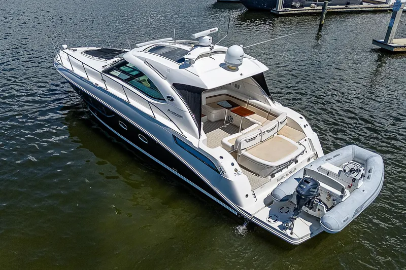  Yacht Photos Pics 2014 Sea Ray 470 Sundancer yacht on water, featuring sleek design and spacious deck.