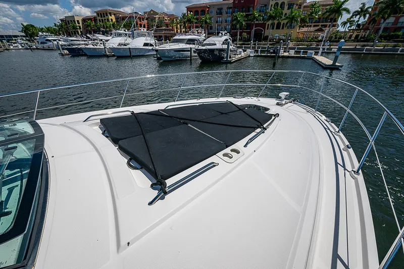  Yacht Photos Pics 2014 Sea Ray 470 Sundancer yacht docked at marina with sunpad on deck.