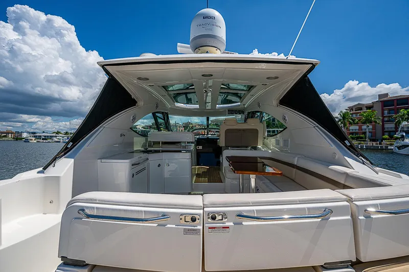 Yacht Photos Pics 2014 Sea Ray 470 Sundancer yacht interior with open deck and seating area.