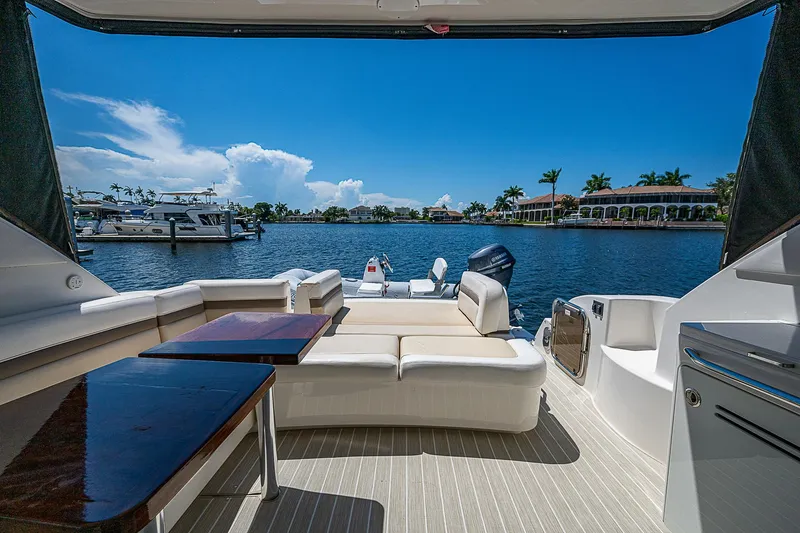  Yacht Photos Pics Luxurious 2014 Sea Ray 470 Sundancer yacht interior with waterfront view.