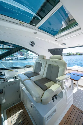  Yacht Photos Pics Interior of 2014 Sea Ray 470 Sundancer yacht with luxurious seating and waterfront view.